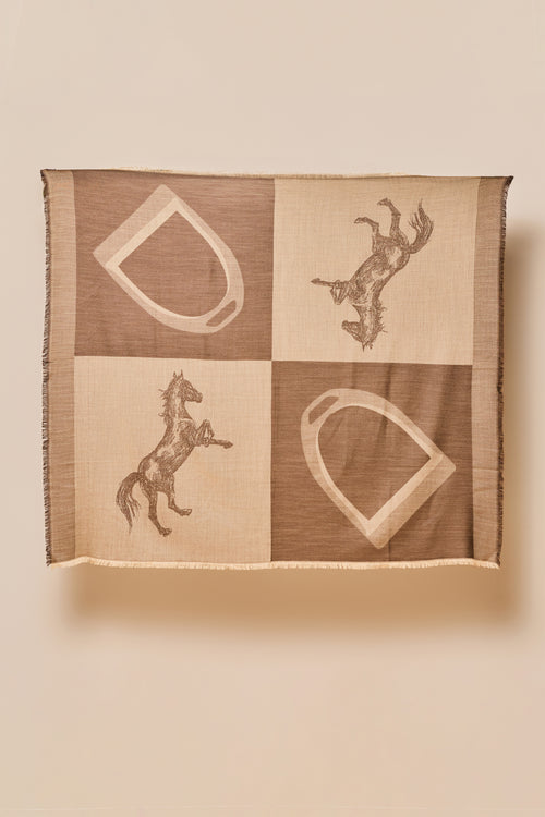 Textile with horse and equestrian symbols on a beige background